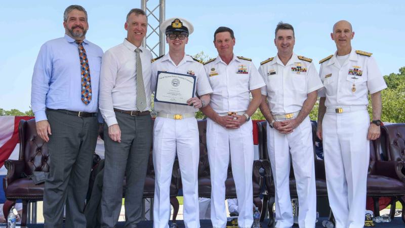 (L-R) Erik Raven US Under Secretary of Defense. Abe Denmark, Senior Advisor to the Secretary of Defense for AUKUS, Lieutenant William Hall, Chief of Royal Australian Navy Vice Admiral Mark Hammond, Director-General Australian Submarine Agency Vice Admiral Jonathan Mead, and Admiral James Frank Caldwell Jr, Director of the Naval Nuclear Propulsion Program.