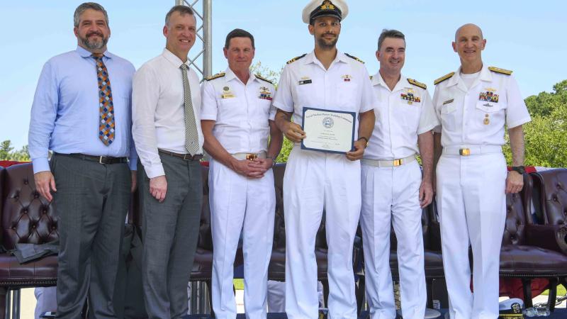 (L-R) Erik Raven US Under Secretary of Defense. Abe Denmark, Senior Advisor to the Secretary of Defense for AUKUS, Chief of Royal Australian Navy Vice Admiral Mark Hammond, Lieutenant Commander Adam Klyne, Director-General Australian Submarine Agency Vice Admiral Jonathan Mead, and Admiral James Frank Caldwell Jr, Director of the Naval Nuclear Propulsion Program.