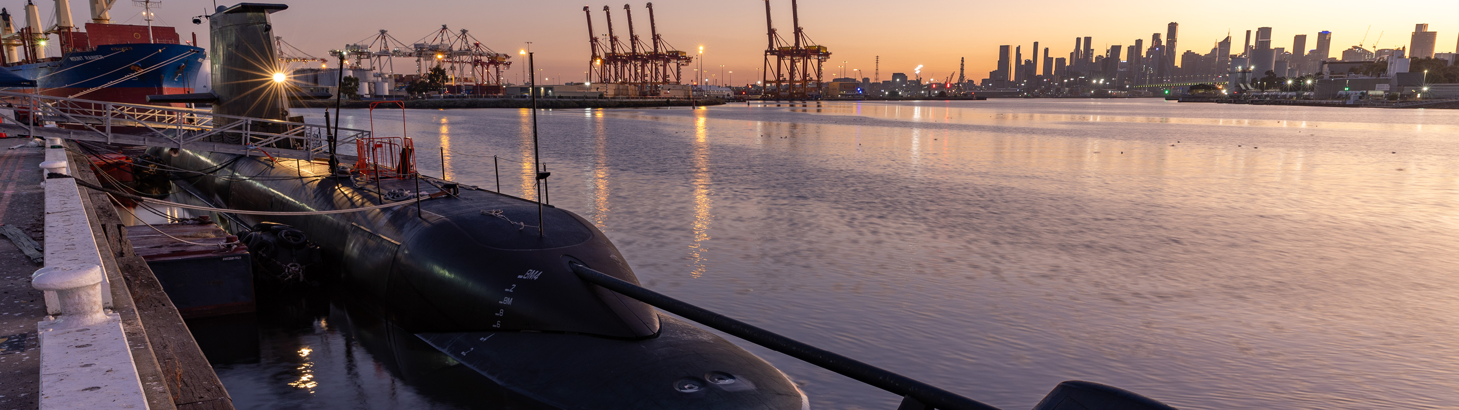 Image of submarine docked in a bay