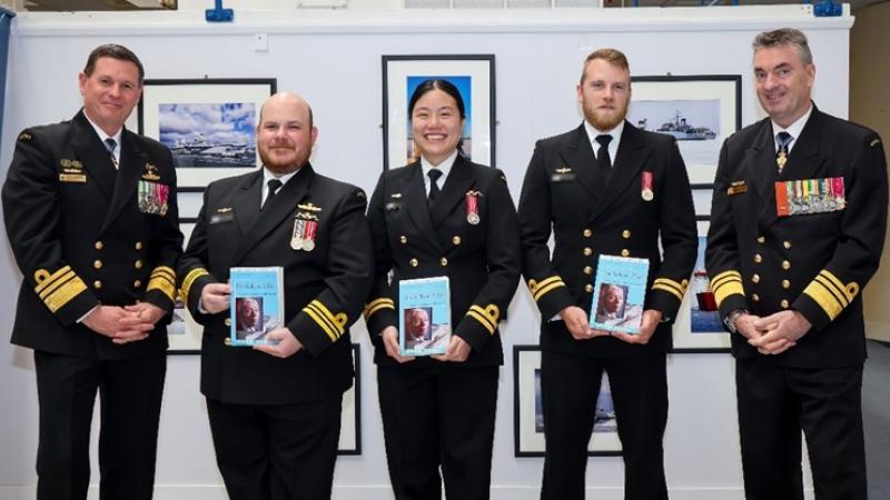 hief of Navy, Vice Admiral Mark Hammond, AO, RAN (far left) and the Director-General of the Australian Submarine Agency Vice Admiral Jonathan Mead, AO, RAN (far right), with Australia's first Navy officers to graduate from the Royal Navy's Nuclear Reactor Course.