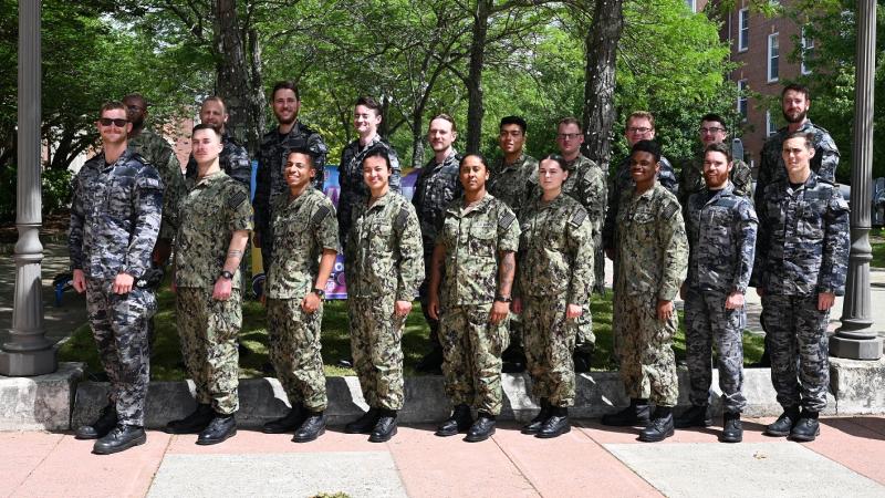 Royal Australian Navy Enlisted Sailors pose for a photograph with their US peers at US Submarine School.